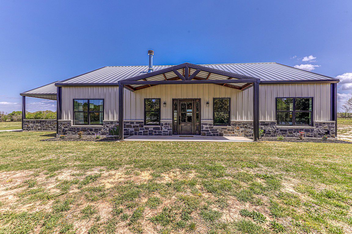 37.25 Acre Turnkey Training Facility, 3/2.5+ Barndominium, 6-Stall Barn, Pipe Roping Arena, 2 Round Pens, 4 Pastures, Ag Exempt